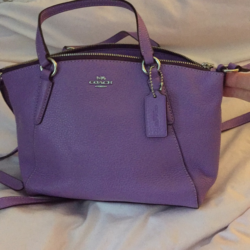 Beautiful purple coach purse